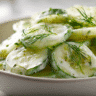 U3823717446 A Bright Close Up Shot Of Creamy Sliced Cucumbers 6939eefd 3d31 4565 Bcab D0a95fc59262 1